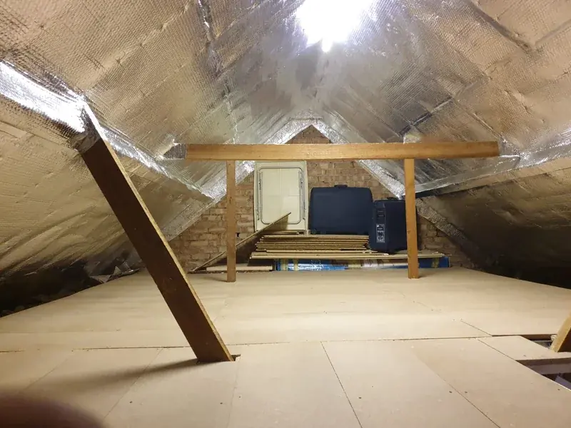 Loft insulated with MultiFOIL across the rafters and fully boarded for storage